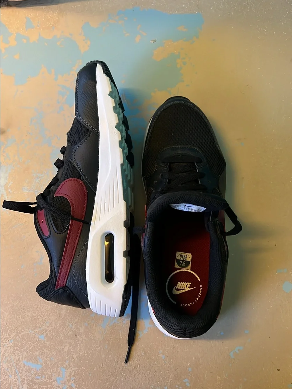 Nike Black Sneakers with Burgundy Swoosh and White Midsole